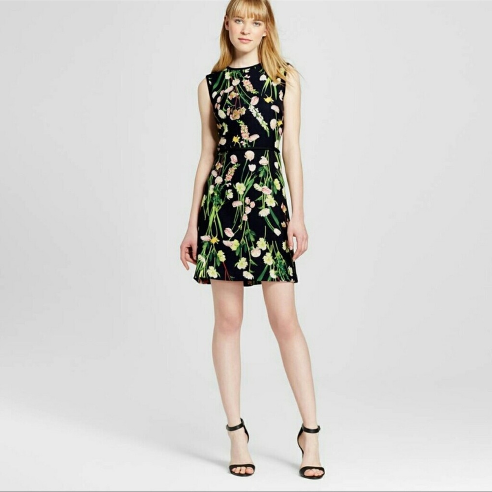 Victoria Beckham black floral fun dress. Can be dressed casually or dressed up.